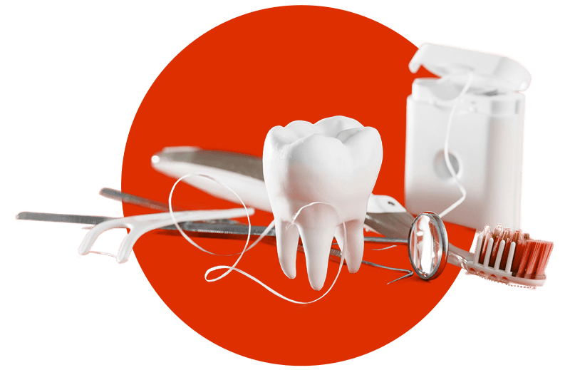 Przybory dentystyczne i model zęba